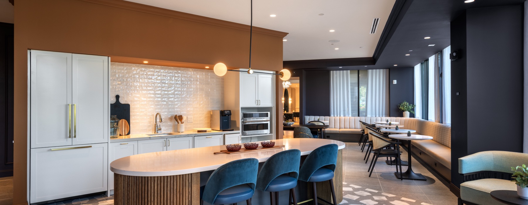 kitchen in large room with ample seating 