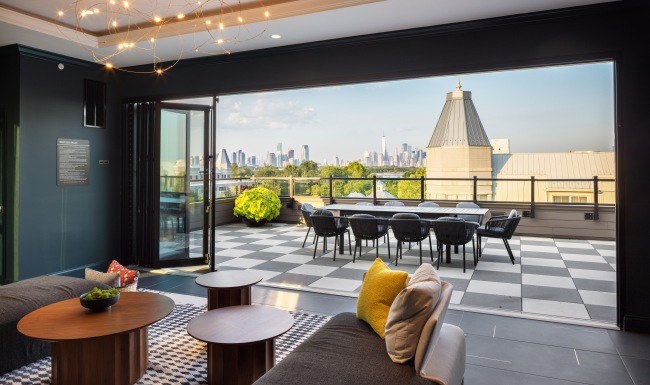 room opened to outdoor space overlooking Manhattan 